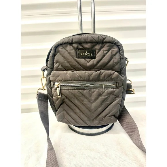 Kedzie Cloud 9 quilted puffer convertible sling bag in gray - Picture 1 of 8